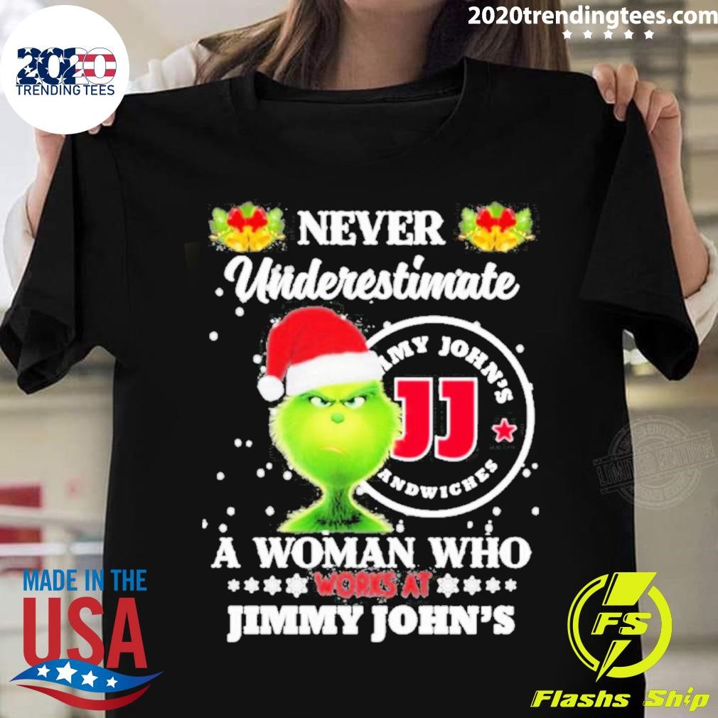 Funny Grinch Hat Santa Never Underestimate A Woman Who Works At Jimmy John’s Logo Christmas Shirt